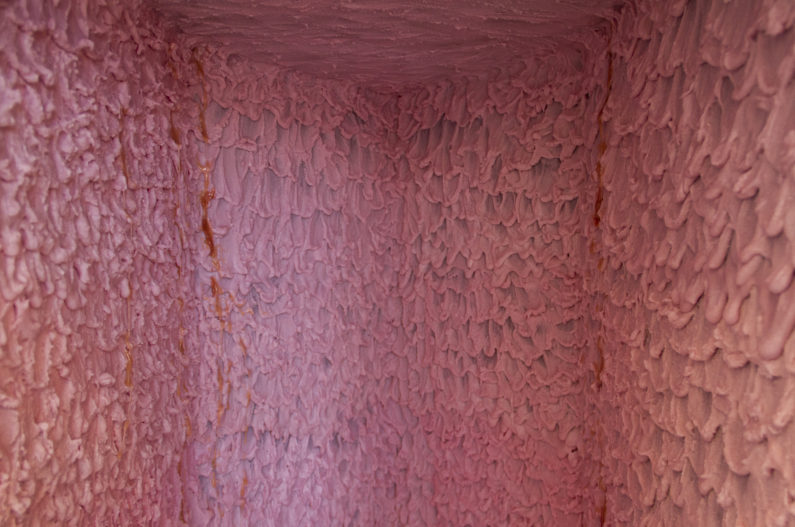 "Piehole," 2016 (detail) Parrafin wax, petroleum dyes, strawberry scent, gelatin, wood 84 x 60 x 60 inches