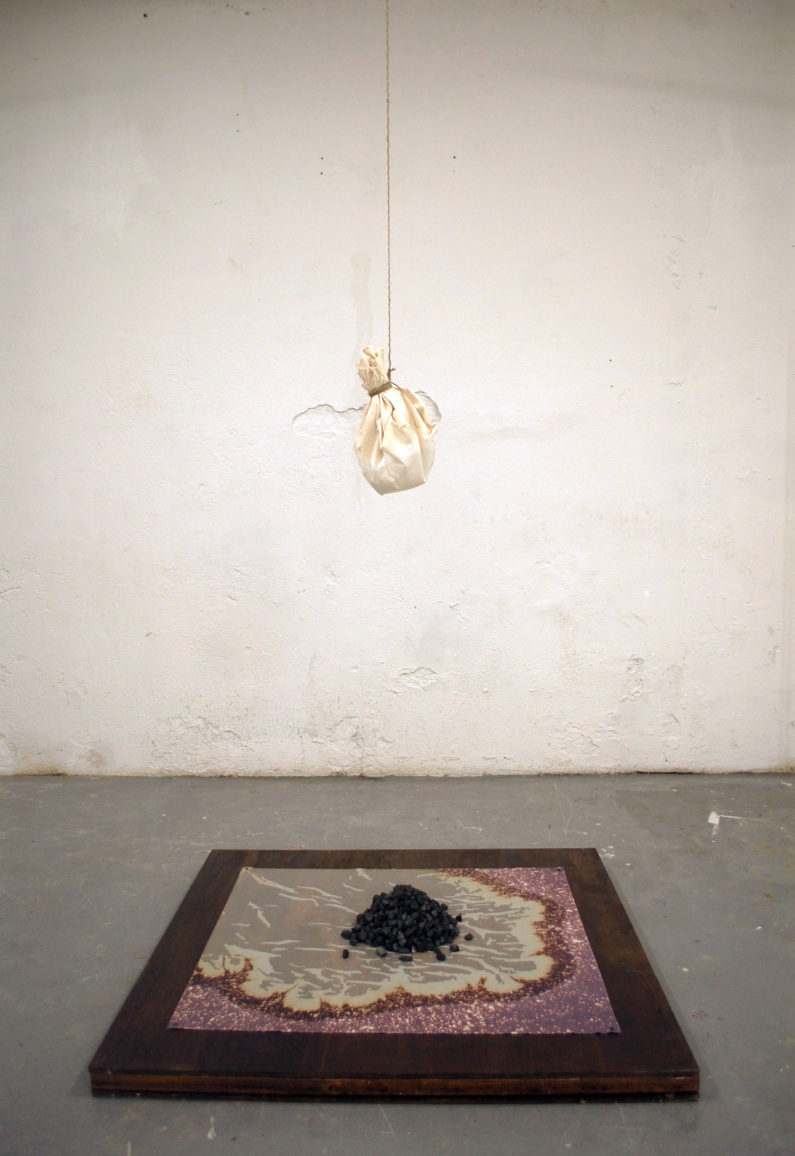 "Untitled," 2013 Dyed fabric, rocks, and bleach on plywood 70 x 35 inches
