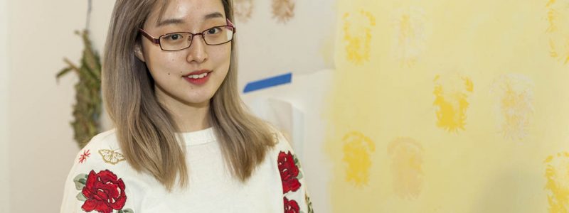 Portrait of the artist in her studio
