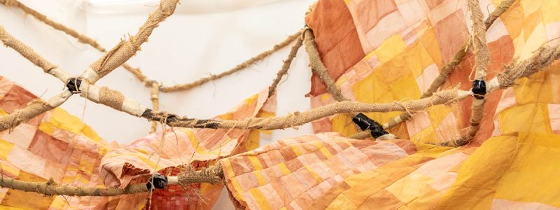 Installation of artwork made from armature wire, burlap, hand-dyed cotton and silk.