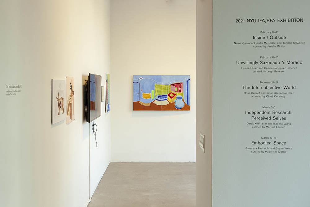 View of entrance to exhibition, with title wall at left.