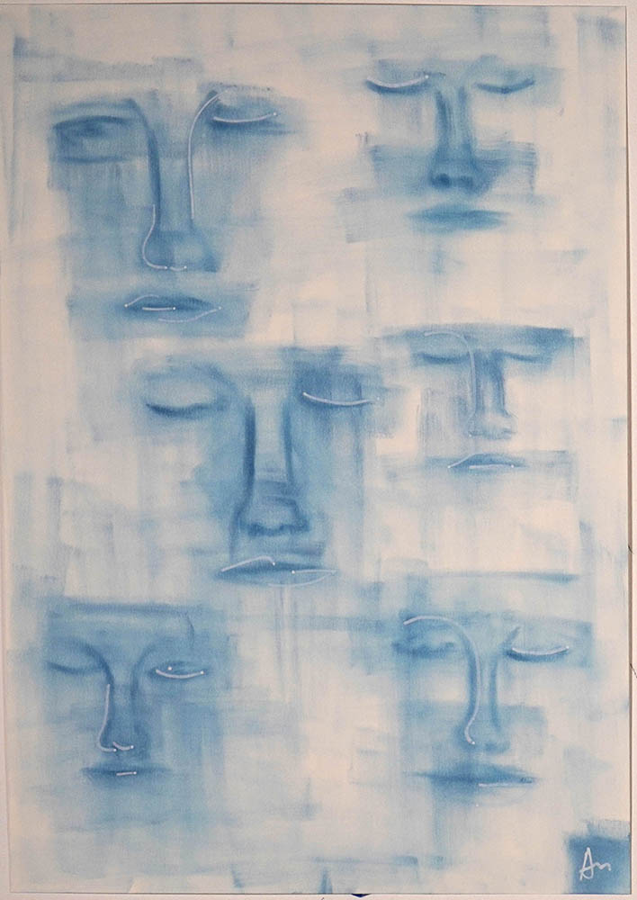 drawing of faces in blue pastel