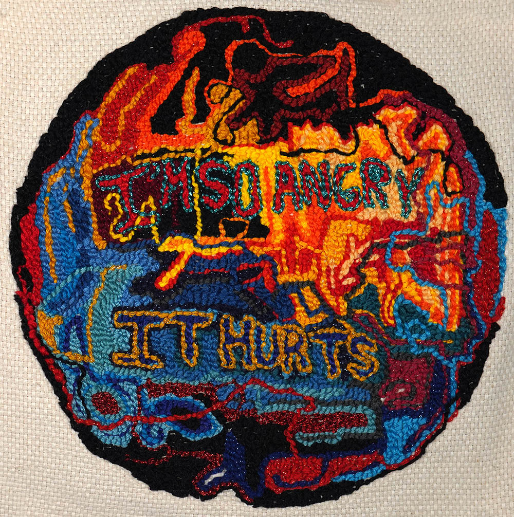 embroidered patch with emotionally charged messages