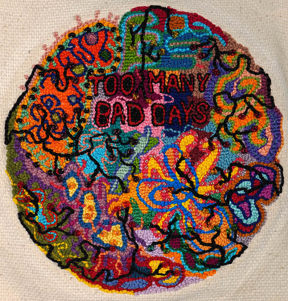 embroidered patch with emotionally charged messages