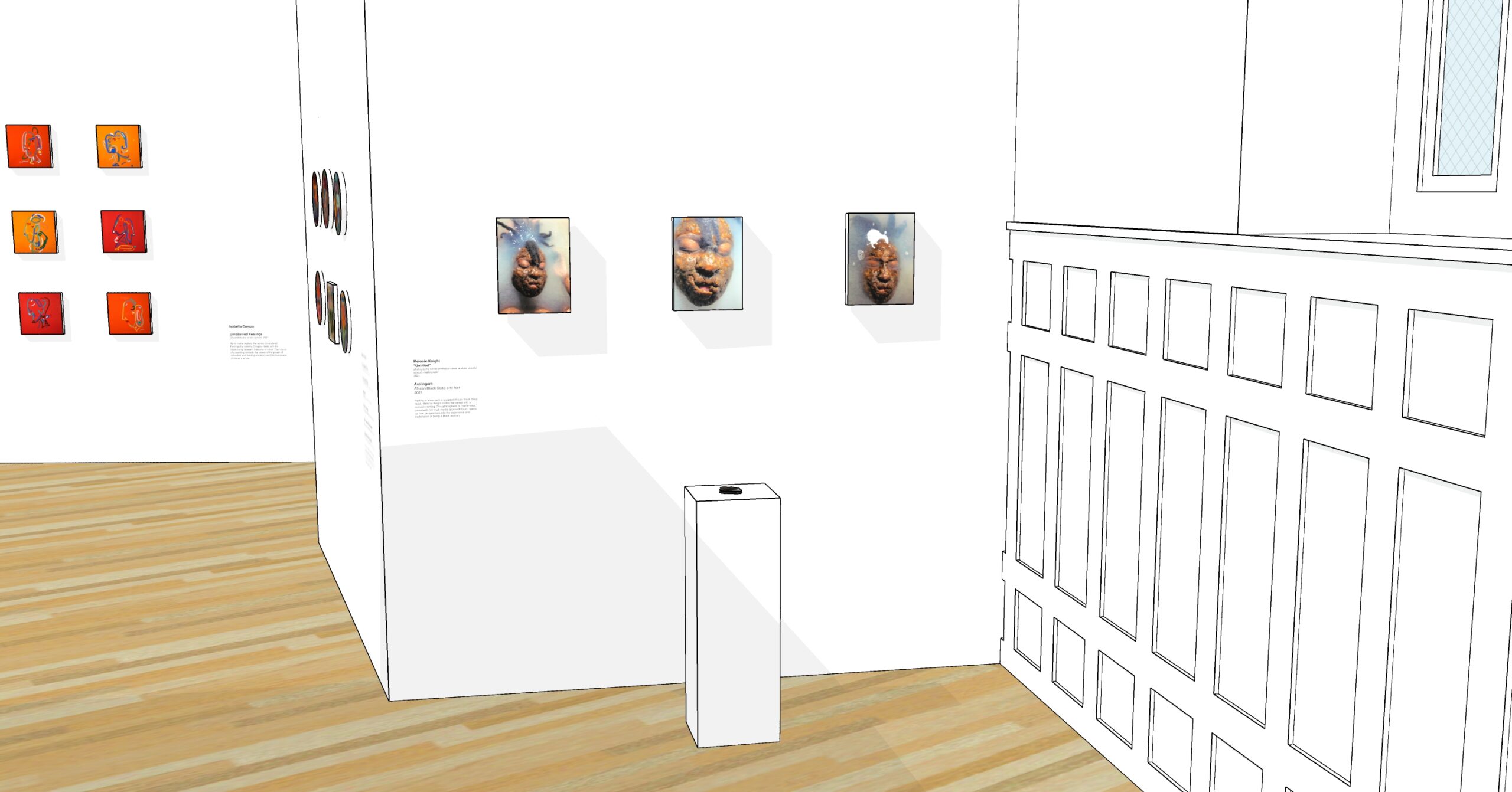 Installation view with three photographs and one sculpture on a pedestal.